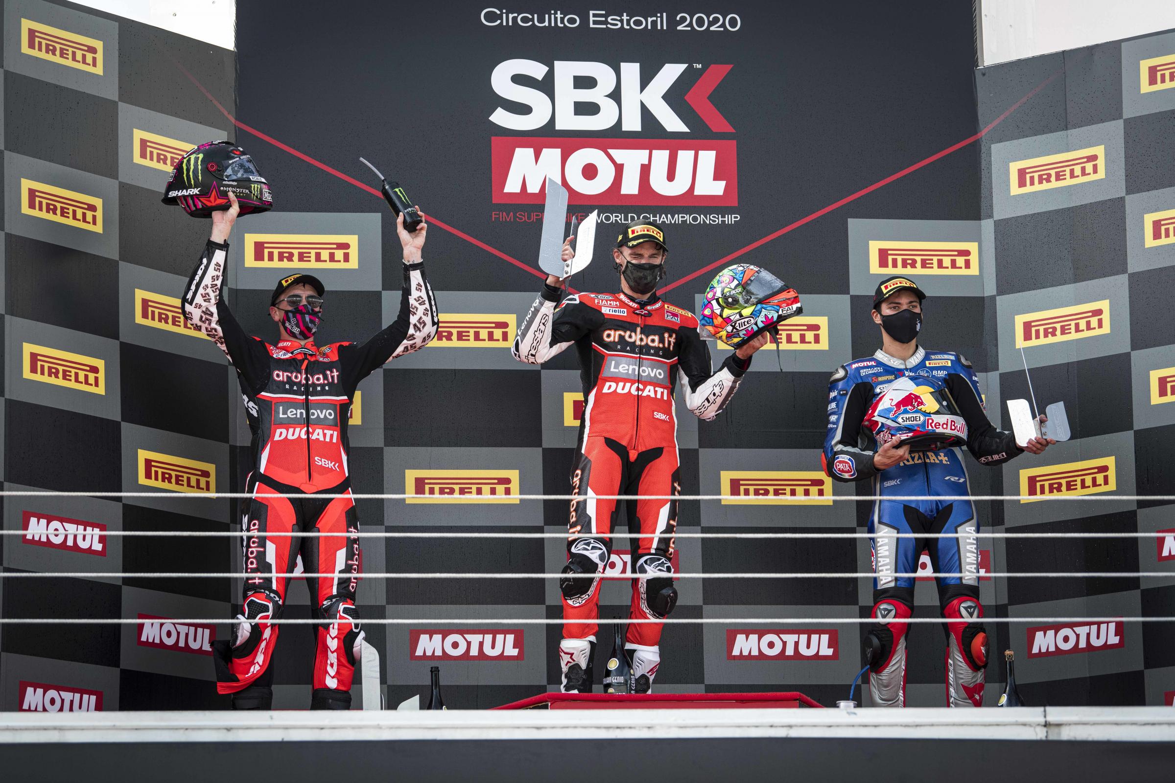 Chaz Davies (centre) celebrates his end of season win in Portugal. Picture by Matteo Cavadini.