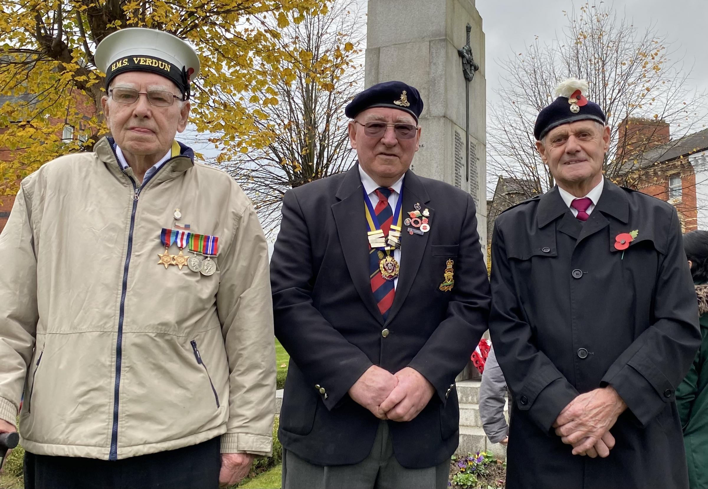 Second World War Royal Navy veteran Jack Ainsworth, 96, from Birmingham; Chairman of the Royal British Legion in Newtown Arfon Williams; Bryan Jandrell, from Newtown, who served with the Royal Welsh Fusiliers in Malaysia in 1955 and 1956, stand together