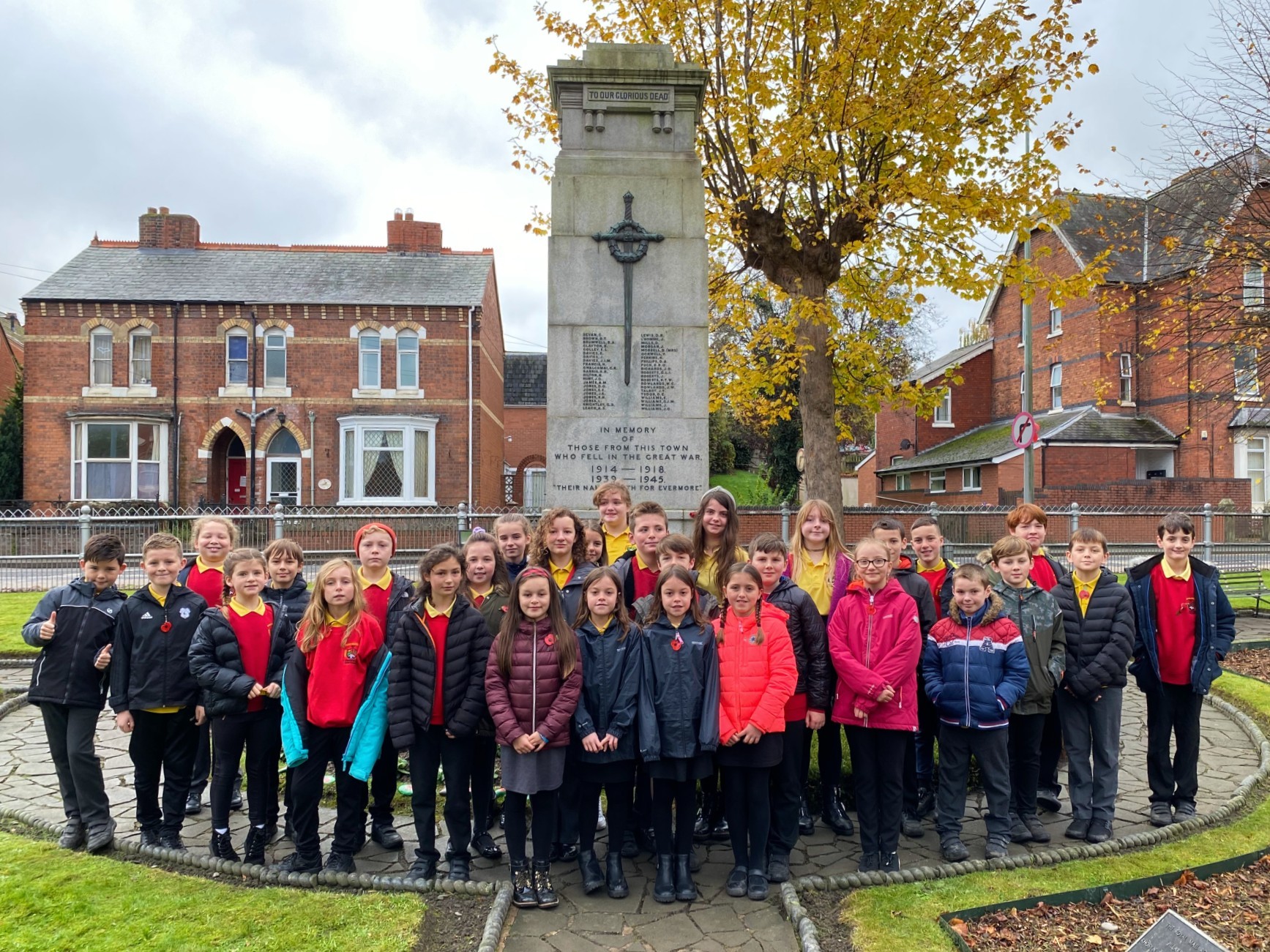 Pupils from Ysgol Penygloddfa attended the Armistice Day service at the War Memorial in Newtown on November 11, 2021. Picture by Anwen Parry/County Times